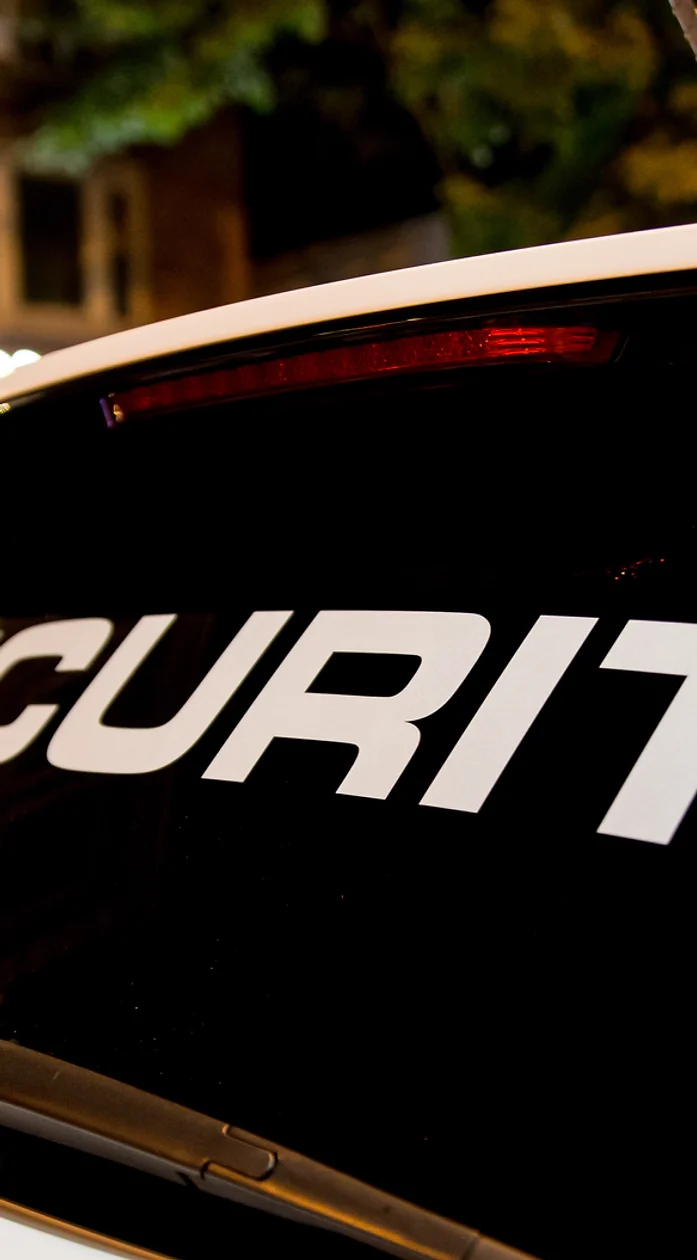 The back of a car with the words security written on it for security in Leicester